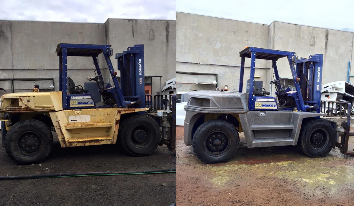 Forklift at different stages of restoration